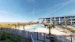 Full sized swimming pool, kiddie pool, and massive sun deck located steps away from your condo - the beach is located just steps away from the pool - it doesn`t get much better